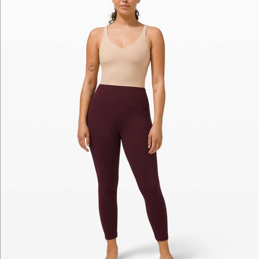 Brand new with tags nude, size 8 align tank. Buttery soft align material